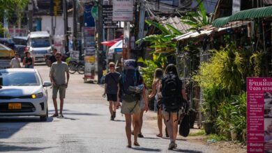 Laos government pledges justice in mass alcohol poisoning case that has killed 6 tourists