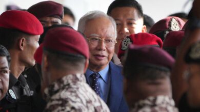 Malaysian court drops one of the graft cases against jailed former premier Najib Razak