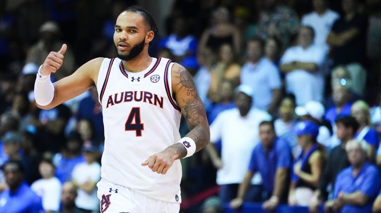 Johni Broome scores 21 and No. 4 Auburn wins Maui Invitational with a 90-76 win over Memphis