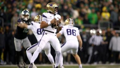 Gabriel throws for 2 TDs and runs for another, No. 1 Oregon routs rival Washington 49-21