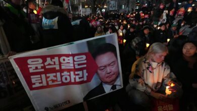 Who is the South Korean leader who tried to impose martial law?