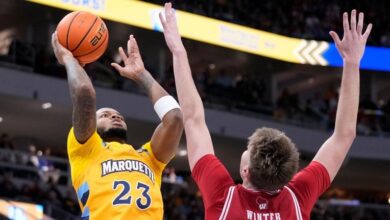 Jones scores 32 points to lead No. 5 Marquette past No. 11 Wisconsin, 88-74