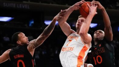 Lainier scores 22 points as No. 1 Tennessee beats Miami 75-62 at Jimmy V Classic