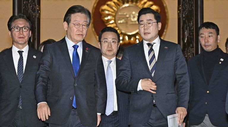 South Korean leaders seek calm after Yoon is impeached