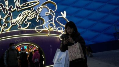 China retail sales slow as consumers hold back, while home prices fall