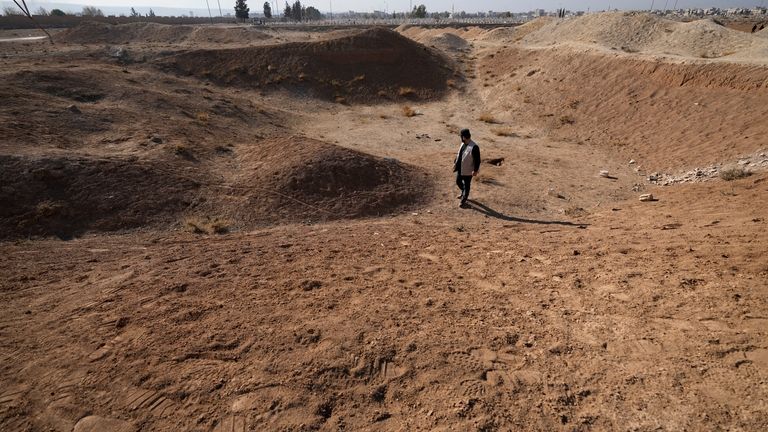 After Assad’s fall, the task of unearthing the dead from Syria’s mass graves is just beginning