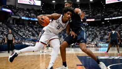 Karaban, Reed lead No. 11 UConn past Xavier 94-89 in overtime in its Big East opener