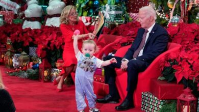 Biden and the first lady bring holiday cheer to patients and families at a children’s hospital