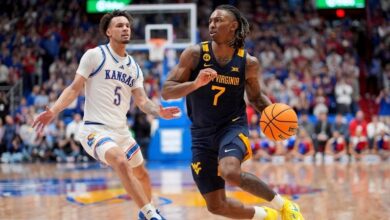 Plane trouble and injuries? West Virginia leans into “No Excuses” mantra for 62-61 win at No. 7 KU