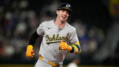 Athletics agree to M, 5-year contract with slugger Brett Rooker, AP source says