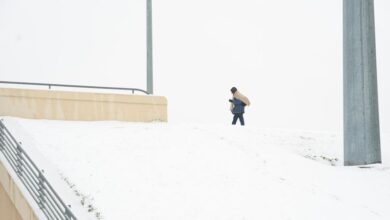 Winter storm plods into the Deep South, prompting states of emergency and school closures