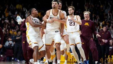 Dawson Garcia hits 3-pointer from edge of logo to lift Minnesota past No. 20 Michigan in OT