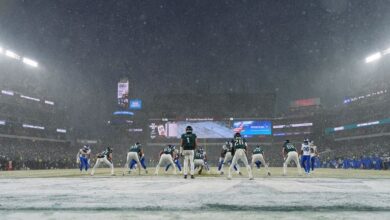 Rams’ fumbles in the snow derail playoff upset bid in Philadelphia