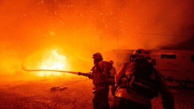 Aerial attack helps firefighters maintain the upper hand on a huge fire north of Los Angeles