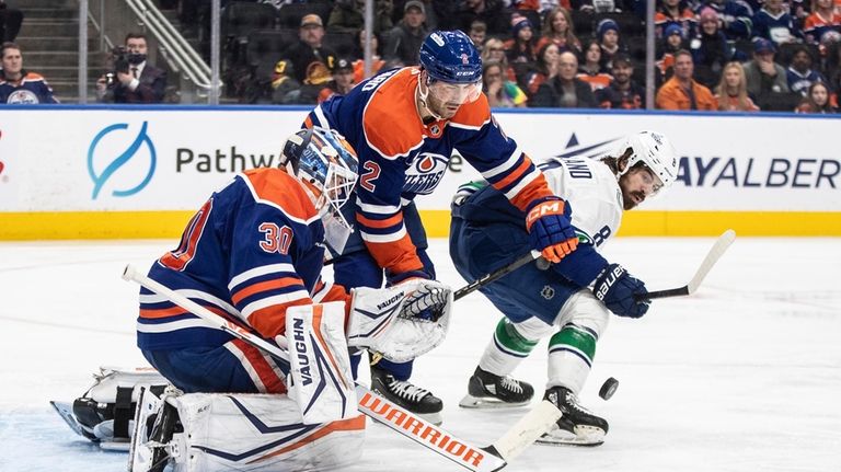 Zach Hyman has 2 goals and an assist for the Oilers in a 6-2 win over the Canucks