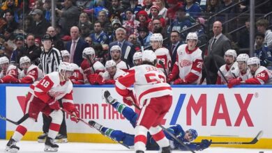 Alex DeBrincat scores in OT as Red Wings edge Canucks 3-2