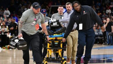 Medics attend to person who collapsed courtside at Spurs, Grizzlies game