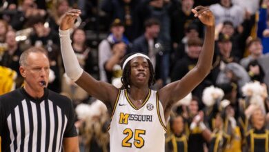 Missouri coach Dennis Gates takes PA microphone to head off court-storming celebration