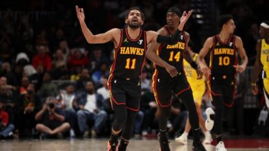 Trae Young has 22 points and 16 assists in the Hawks’ 124-118 victory over the Pacers