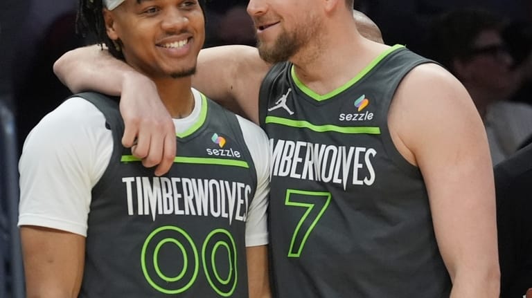 Conley, Reid and DiVincenzo lead the Timberwolves to 106-104 victory over the Heat