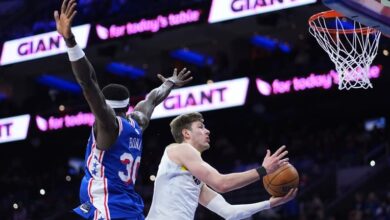 Walker scores 25 as the 76ers open 22-point 4th-quarter lead, hold on to beat the Jazz 126-122