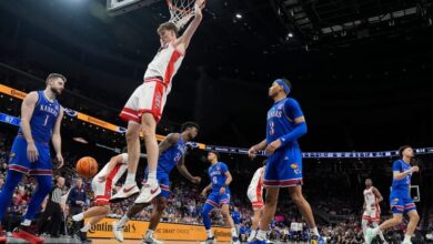 Arizona pulls away late to beat Kansas 88-77 in a Big 12 Conference Tournament quarterfinal