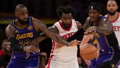 Lakers hold off Rockets 104-98 with 6 3-pointers apiece from Dorian Finney-Smith, Gabe Vincent