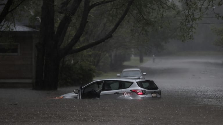 At least 16 dead in flooding and tornadoes as storms slash US South and Midwest